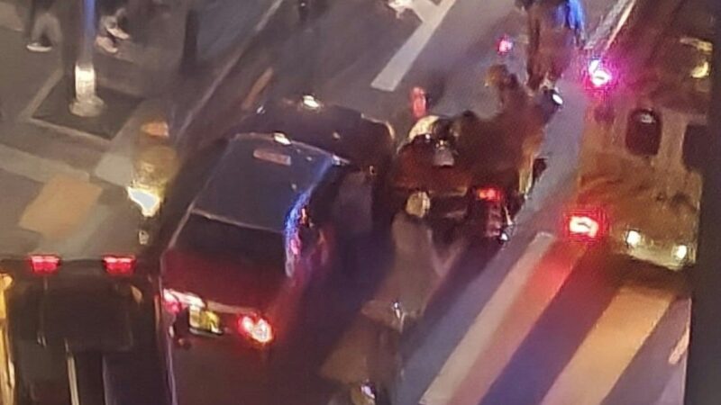 Pedestrians help to lift taxi after Hong Kong girl’s leg trapped in accident