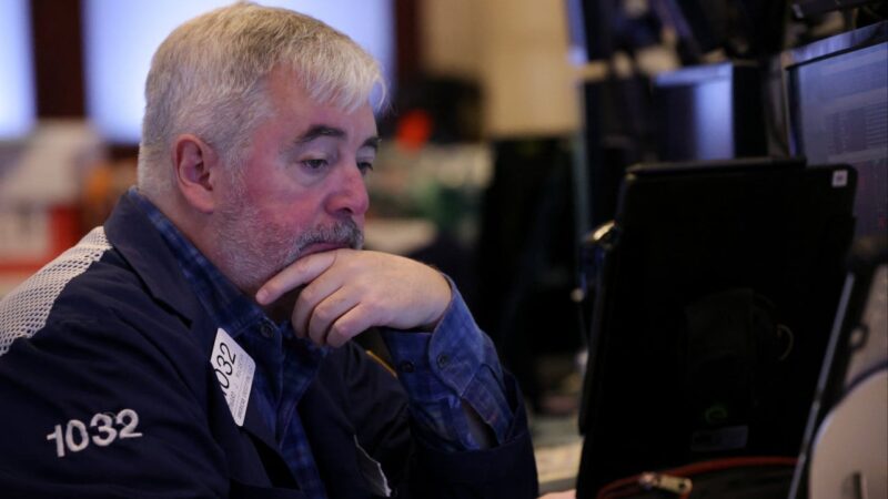 Wall Street sinks following signals of sputtering US economy