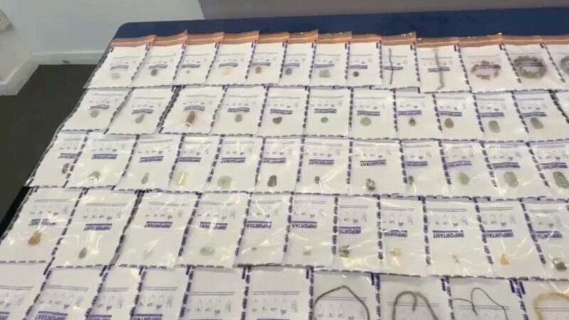 Hong Kong police arrest 2, hunting third over burglaries at antiques warehouse