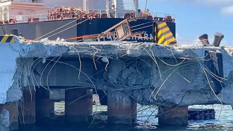 Foreign ship carrying 170,000 tons of Australian ore arrested in Vietnam after pier crash